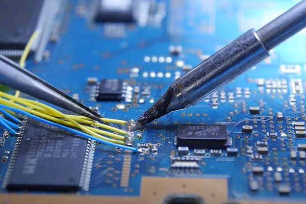 How do you remove a soldering iron tip from a PCB board?